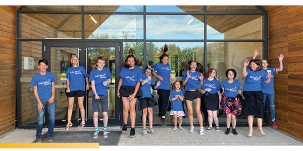 Picture of kids at camp jumping in the air