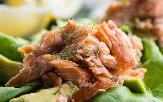 Romaine lettuce leaves topped with salmon salad