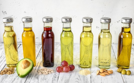 An image of a variety of cooking oils bottles