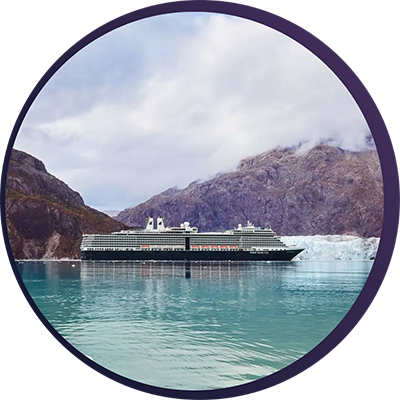 Holland America cruiseship near the coast and part of an iceberg