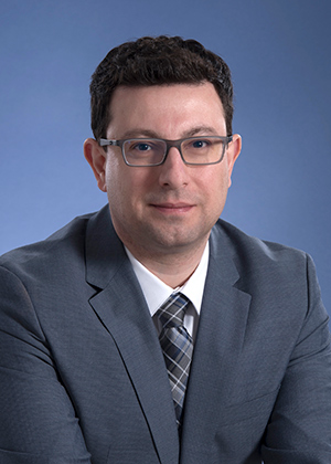 Dr. Zahi Touma
