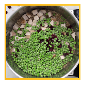 Add vegetables and chicken, simmer